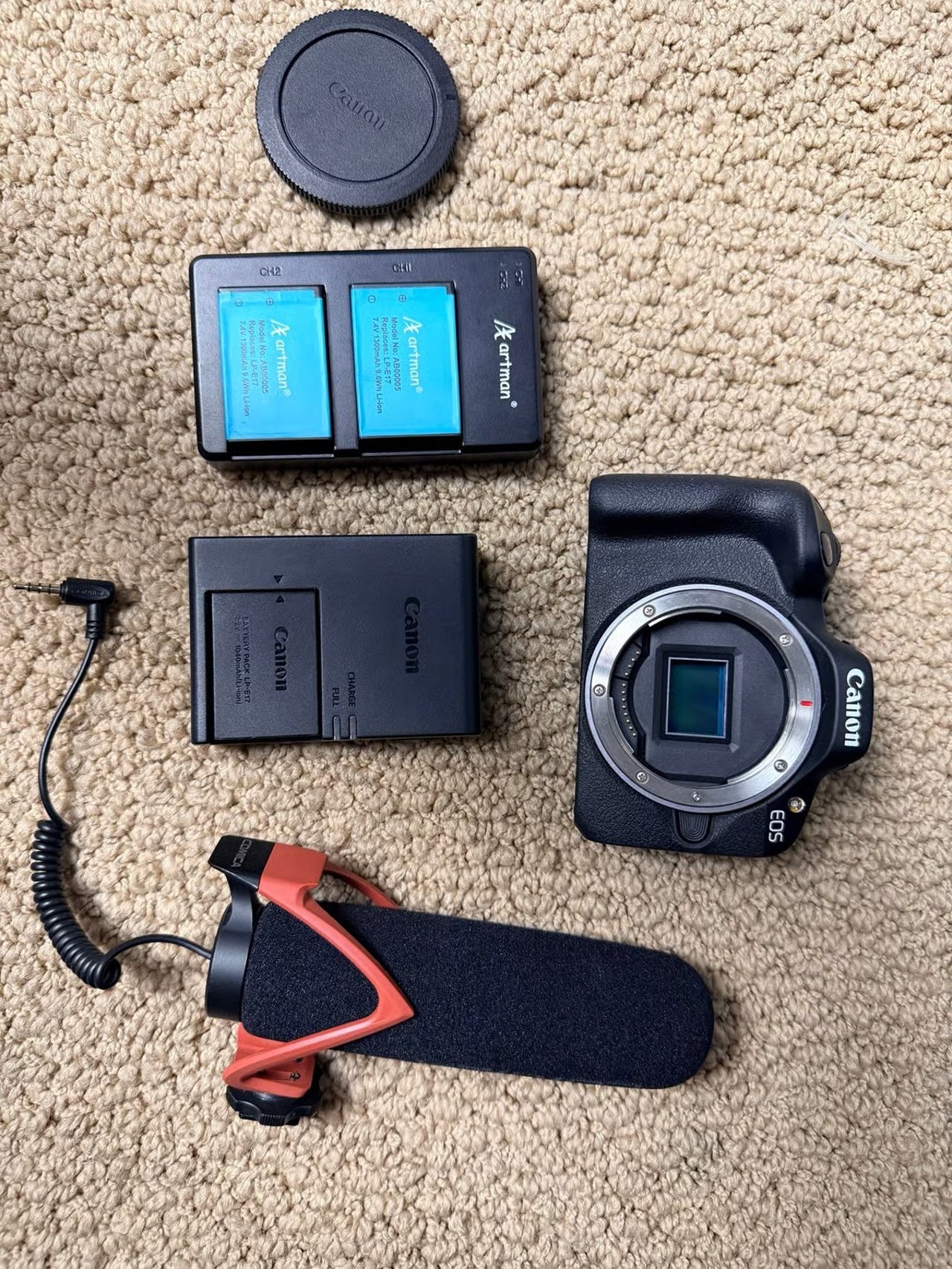 Canon EOS R50 Mirrorless Camera Body, Bag + Artman Batteries & Comica Microphone